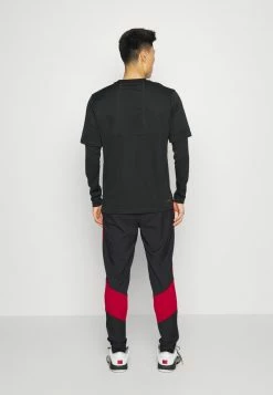 Jordan WOVEN PANT - Pantalones Deportivos - Black/gym Red, Hombre -Jordan Tienda Oficial 1ff506a93f0644fe9f5bef01efff22c5