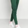 Jordan AIR PANT - Pantalones Deportivos - Noble Green/black , Hombre -Jordan Tienda Oficial 2b7b4bea46dc462f89e00a68ff948faf
