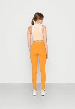 Jordan CORE - Leggings - Light Curry/white Onyx, Mujer -Jordan Tienda Oficial 3a53682ff4f24978bb80016c4fe34213