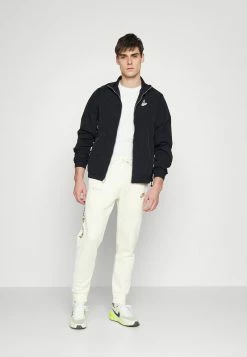 Jordan WARMUP - Chaqueta Fina - Black , Hombre -Jordan Tienda Oficial 5d3ffe1eab2946979c485448f4b4c406