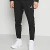 Jordan AIR PANT - Pantalones Deportivos - Black/white , Hombre -Jordan Tienda Oficial 9436dc4b40cb4595b8a4e1bea1e49254
