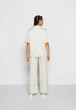 Jordan HERITAGE - Camisa - Light Orewood , Mujer -Jordan Tienda Oficial ac435b77605c4fedb544ca0235c3a993