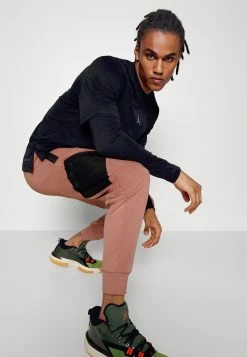 Jordan PANT - Pantalones Deportivos - Fossil Rose/black , Hombre -Jordan Tienda Oficial ba0e1fa457e649a29a3f33f8bb20c64f