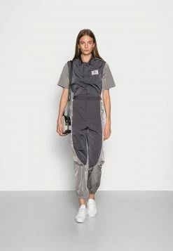 Jordan ESSEN FLIGHTSUIT - Mono - Thunder Grey/moon Particle , Mujer -Jordan Tienda Oficial c5f8ddfa0fd34ab6bcd21b2c23ef1ae1
