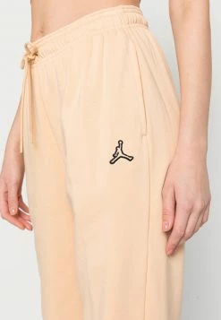 Jordan PANT CORE - Pantalones Deportivos - Orange, Mujer -Jordan Tienda Oficial e5686da4c153419185b675e87a6ed0d6