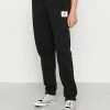 Jordan PANT - Pantalones Deportivos - Black/sail , Mujer